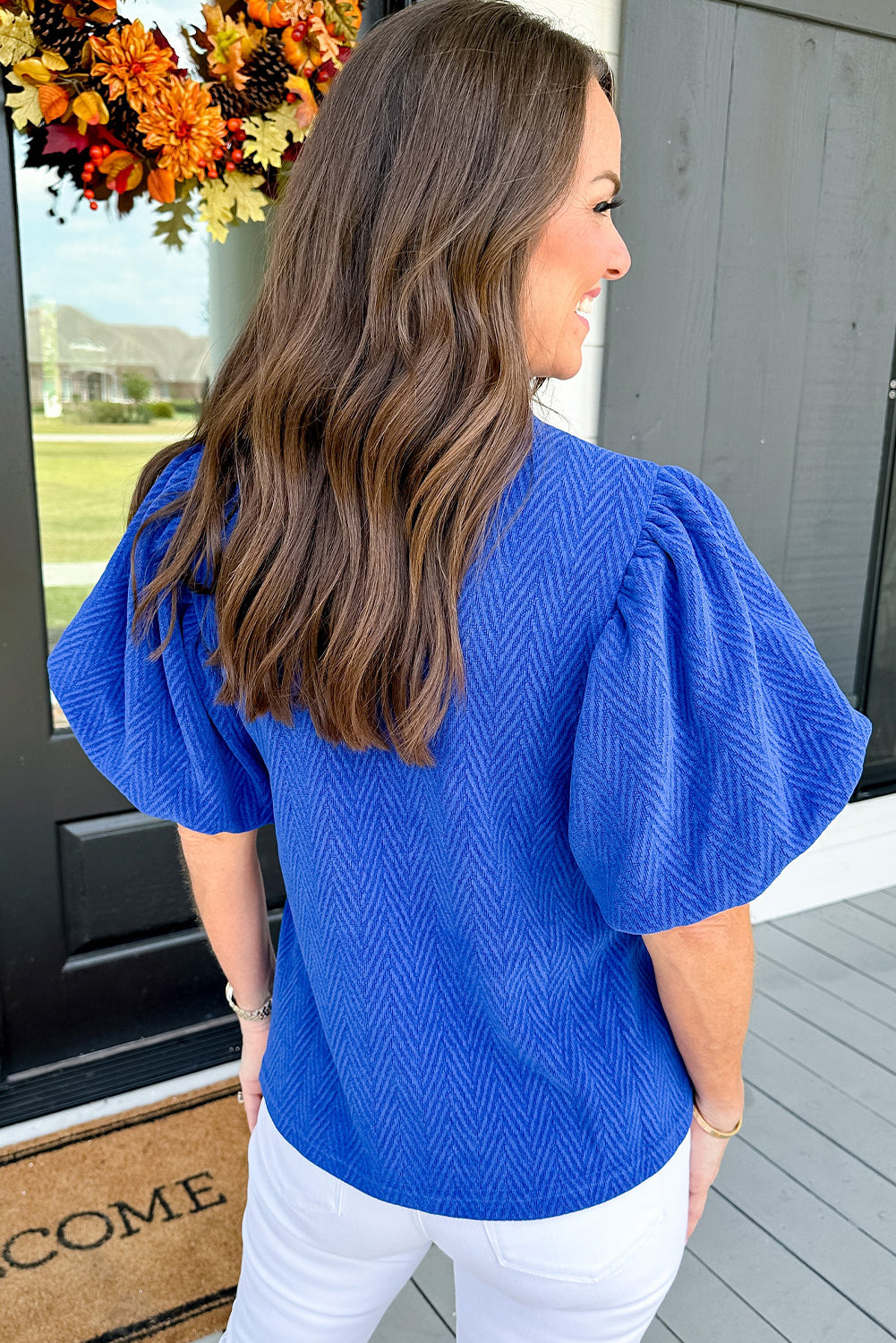 Black Solid Textured Puff Sleeve Mock Neck Blouse