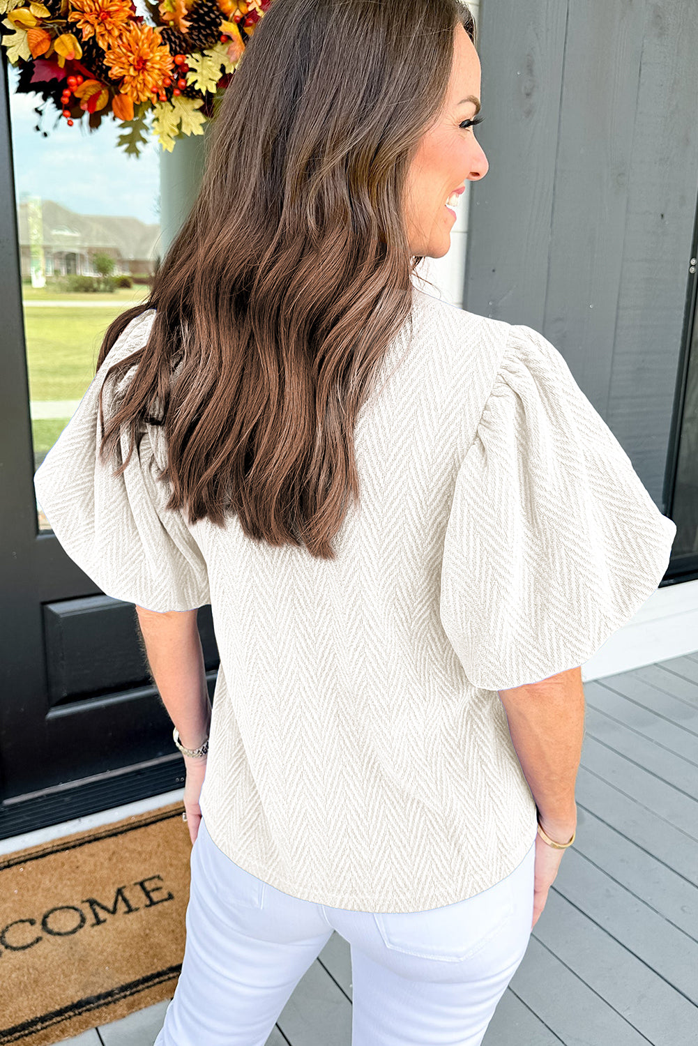 Black Solid Textured Puff Sleeve Mock Neck Blouse